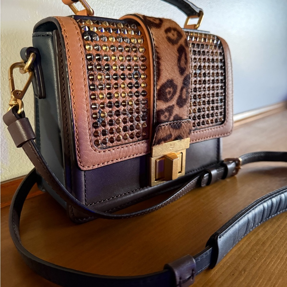 MCM studded top handle bag